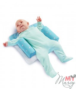 Ортопедическая подушка-позиционер фиксирует тело ребенка